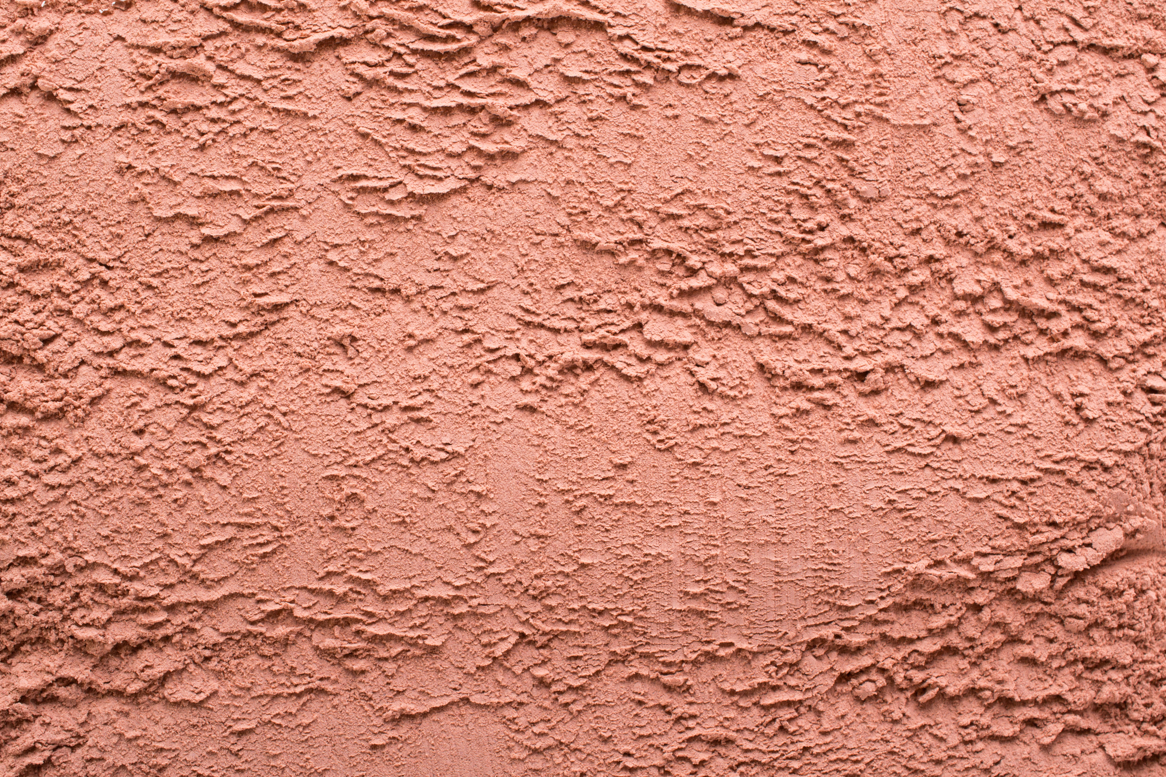 Cosmetic  red clay texture, background. Natural mask, dry clay for the face and body.